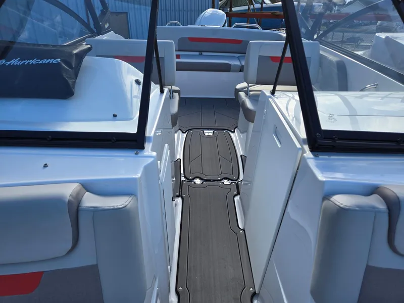 Slide: The Image of 2025 Hurricane SunDeck 235 OB interior with sleek seating and modern design. - 10