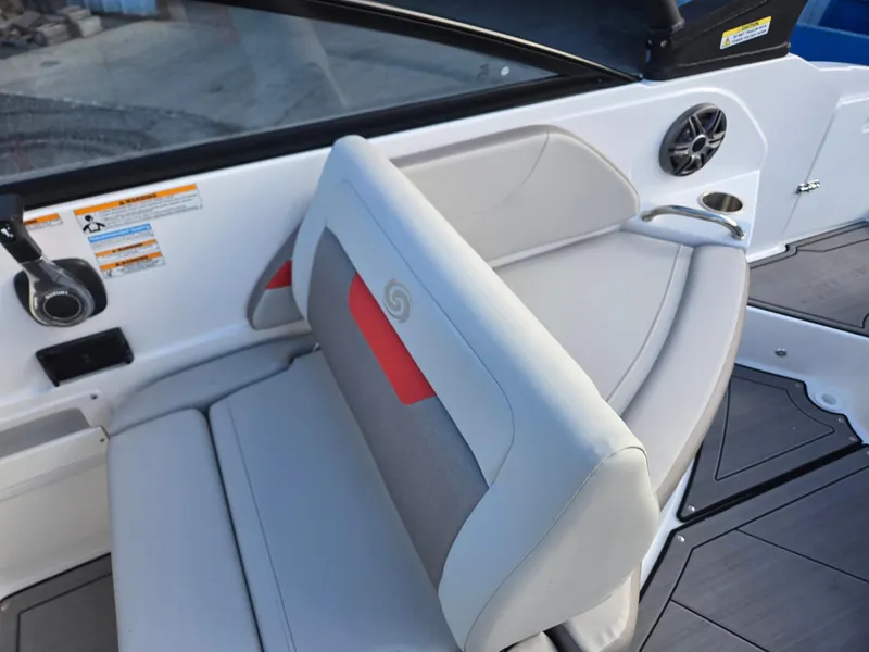 Slide: The Image of 2025 Hurricane SunDeck 235 OB boat interior with gray and red seating. - 19