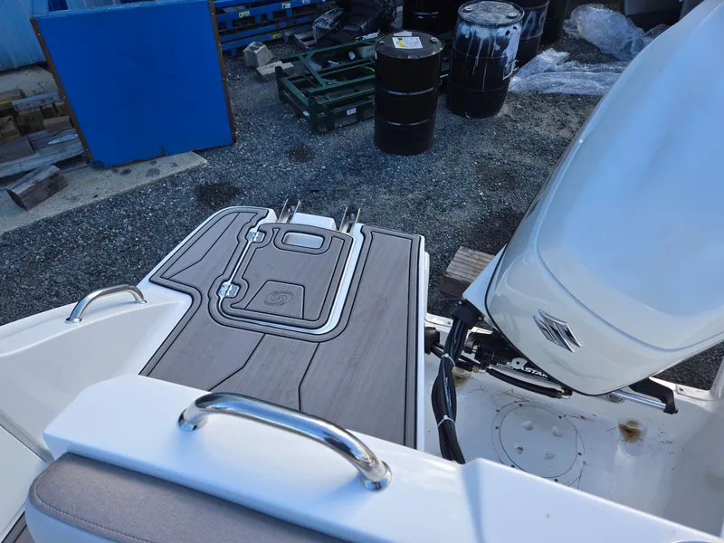 Slide: The Image of 2025 Hurricane SunDeck 235 OB boat with outboard motor and swim platform. - 30