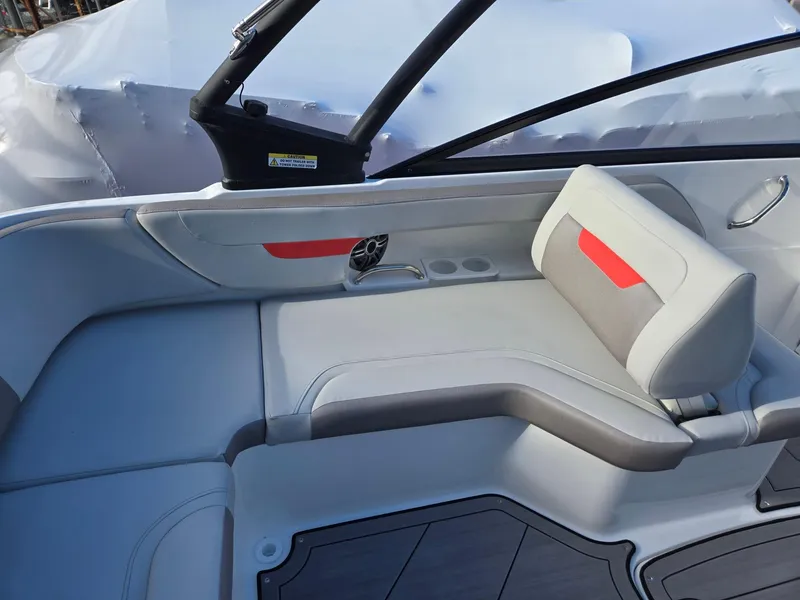 Slide: The Image of 2025 Hurricane SunDeck 235 OB boat interior with sleek seating and modern design. - 33