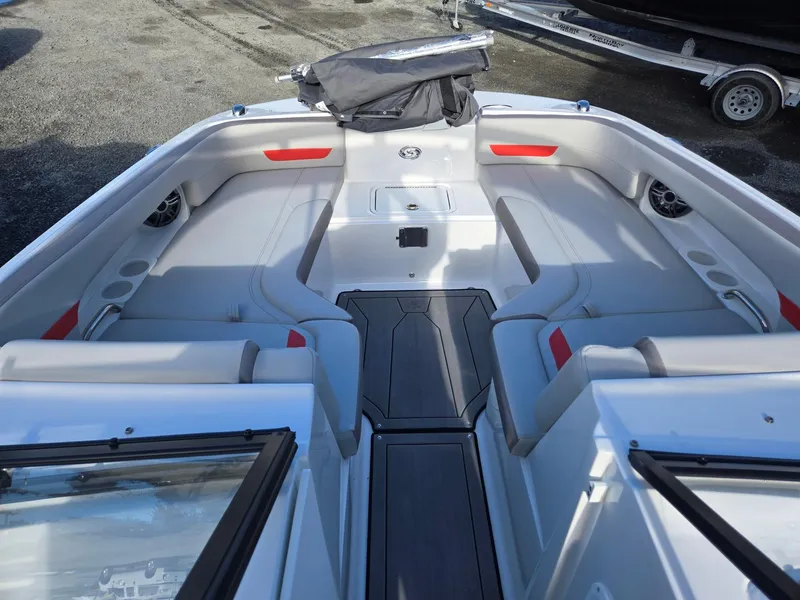 Slide: The Image of 2025 Hurricane SunDeck 235 OB boat interior with spacious seating and modern design. - 38