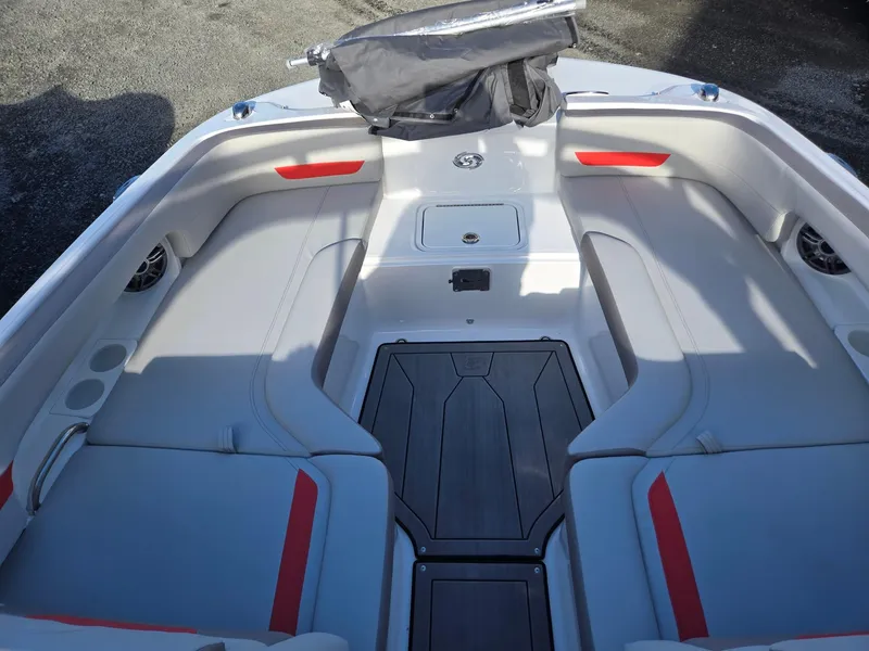 Slide: The Image of 2025 Hurricane SunDeck 235 OB boat interior with spacious seating and modern design. - 42