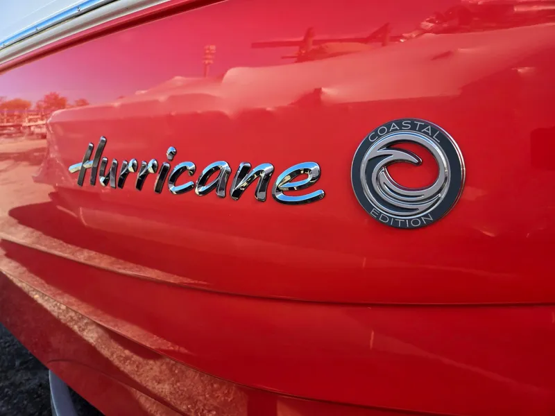 Slide: The Image of 2025 Hurricane SunDeck 235 OB, red exterior, Coastal Edition badge. - 43