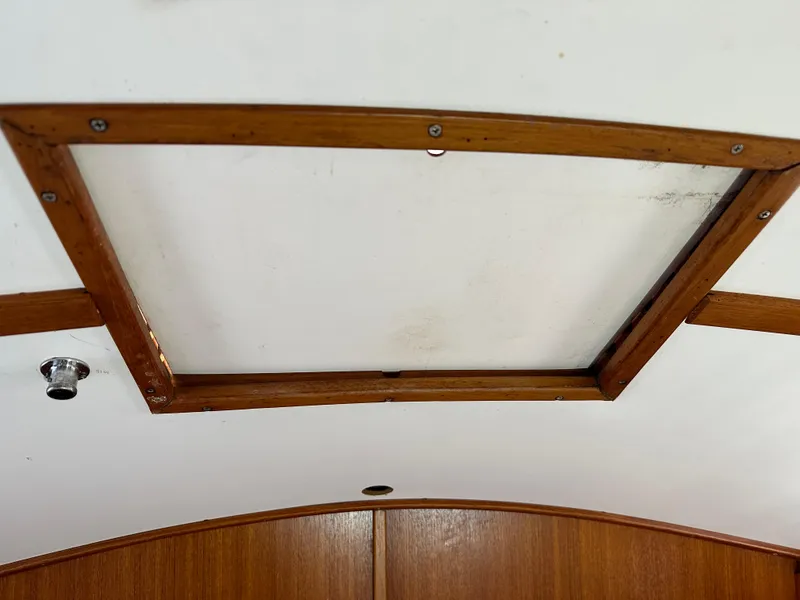 Slide: The Image of Wooden hatch interior of 1978 Rival 41C boat. - 10