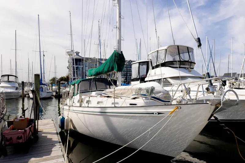 Slide: The Image of Sailing yacht Rival 41C from 1978 gliding on blue ocean waters. - 2