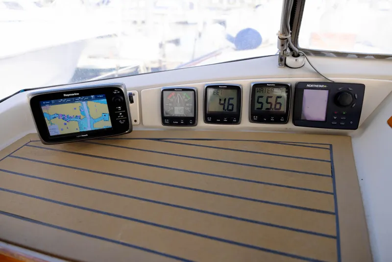 Slide: The Image of Boat dashboard with navigation and instrument displays, Rival 41C, 1978 model. - 40