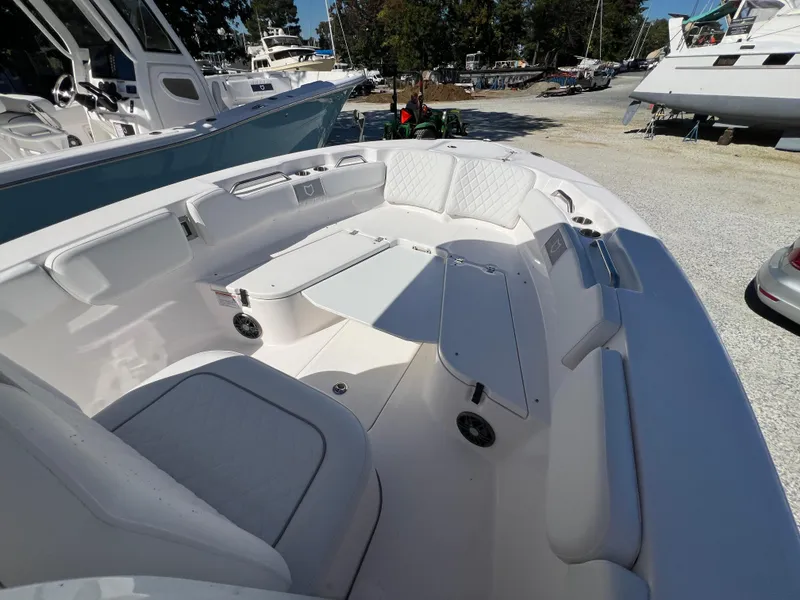 Slide: The Image of 2025 Sea Fox 248 Commander boat interior with seating and storage compartments. - 5