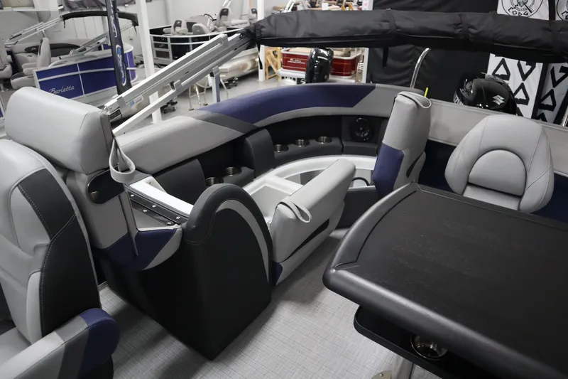 Slide: The Image of 2025 South Bay 222E boat interior with modern seating and sleek design. - 14