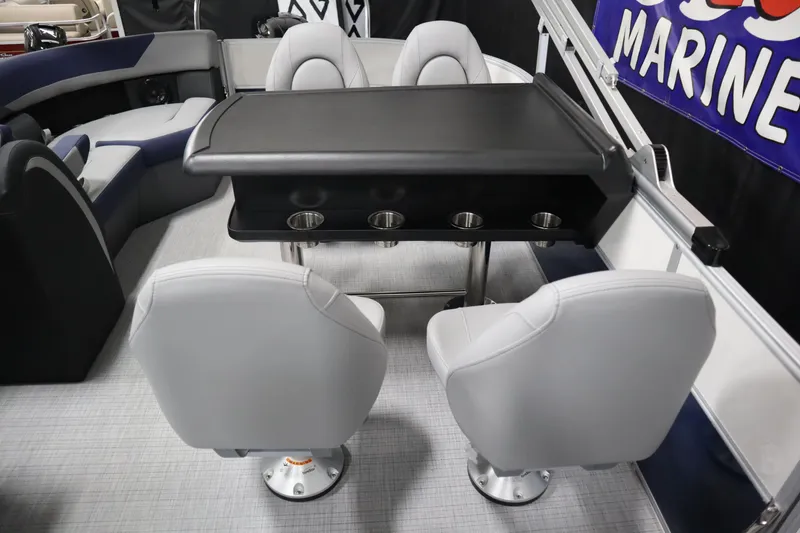 Slide: The Image of 2025 South Bay 222E boat interior with seating and table, showcasing modern design and comfort. - 18