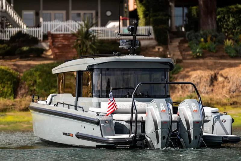 Slide: The Image of 2025 BRABUS 1000 Cross Cabin Signature Edition boat on water, rear view. - 12