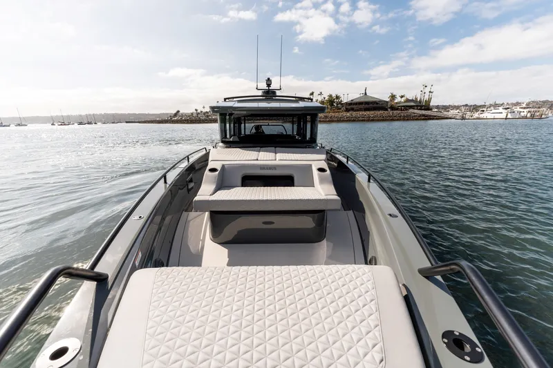 Slide: The Image of 2025 BRABUS 1000 Cross Cabin Signature Edition yacht on calm waters, showcasing luxury design. - 14