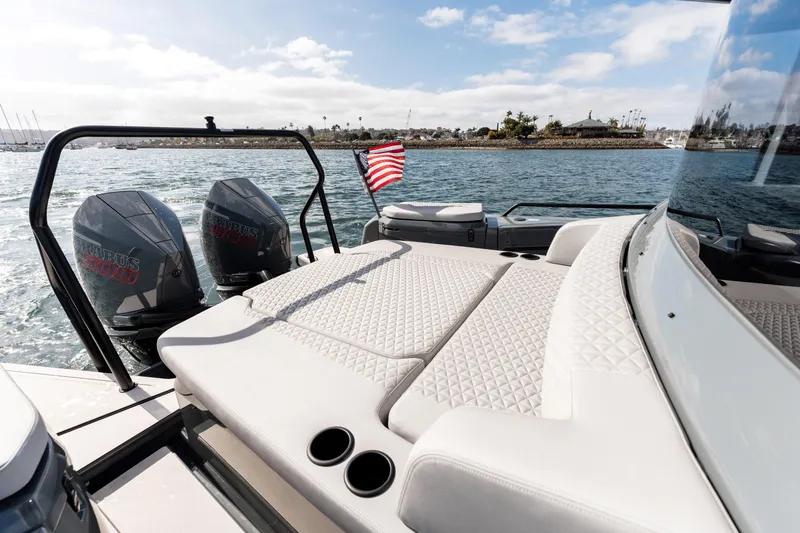 Slide: The Image of 2025 BRABUS 1000 Cross Cabin Signature Edition boat with luxurious seating and dual engines. - 16