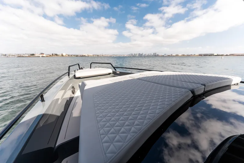 Slide: The Image of 2025 BRABUS 1000 Cross Cabin Signature Edition yacht with luxurious deck seating. - 17