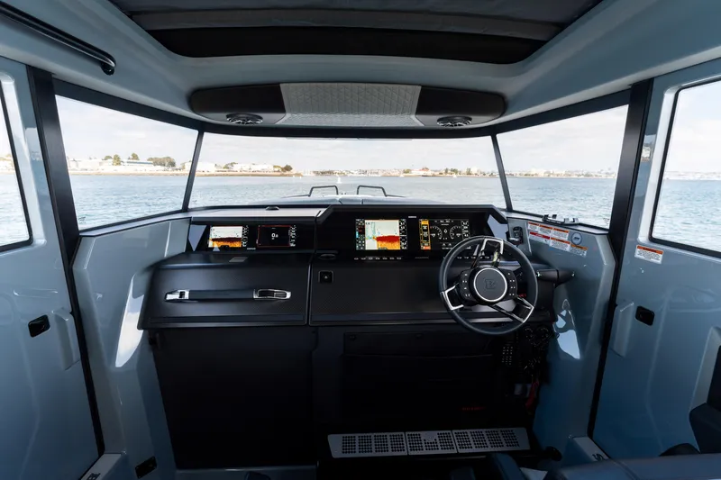 Slide: The Image of Interior of 2025 BRABUS 1000 Cross Cabin Signature Edition, featuring modern dashboard and steering. - 19