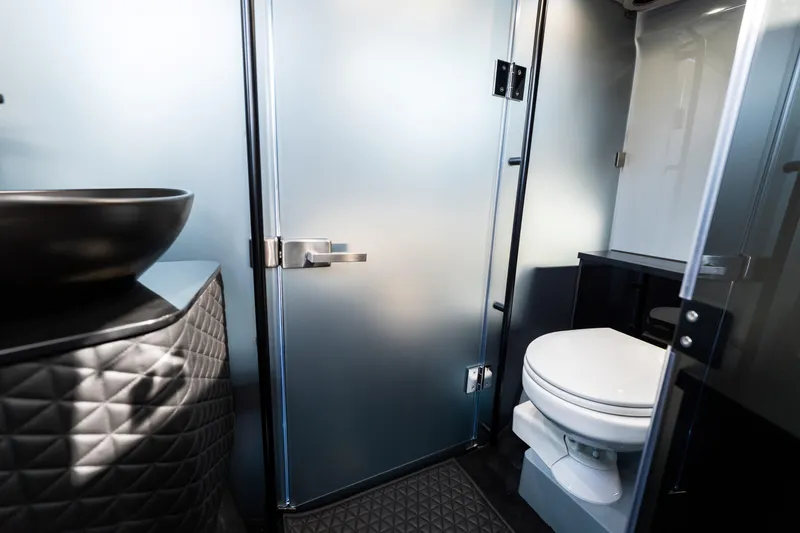 Slide: The Image of Luxurious bathroom in 2025 BRABUS 1000 Cross Cabin Signature Edition with modern fixtures. - 23