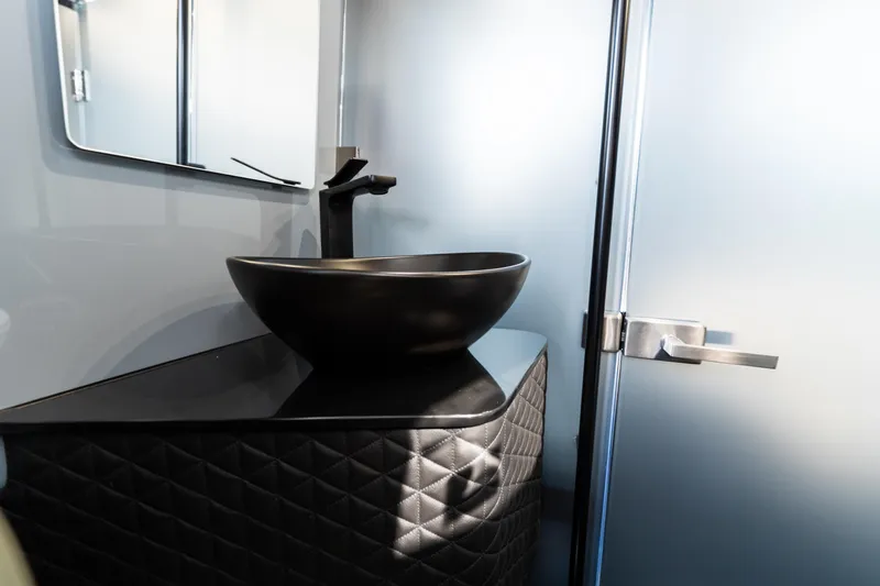 Slide: The Image of Luxurious bathroom sink in 2025 BRABUS 1000 Cross Cabin Signature Edition. - 24