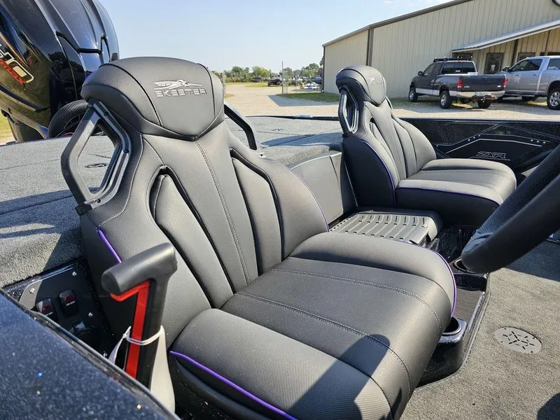 Slide: The Image of Luxurious interior of 2025 Skeeter ZXR19 boat with sleek black seats. - 10