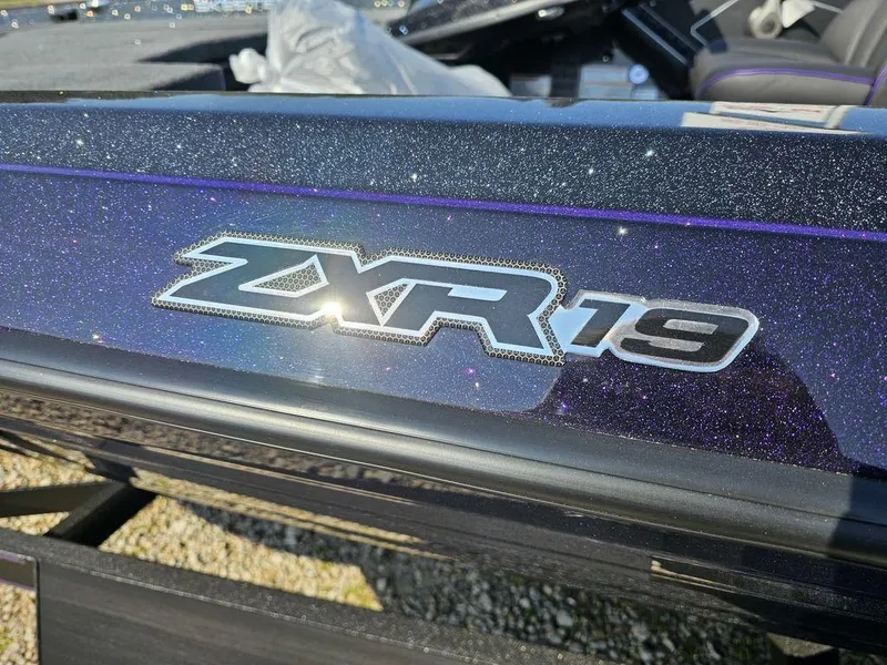 Slide: The Image of 2025 Skeeter ZXR19 boat with metallic finish and logo detail. - 4