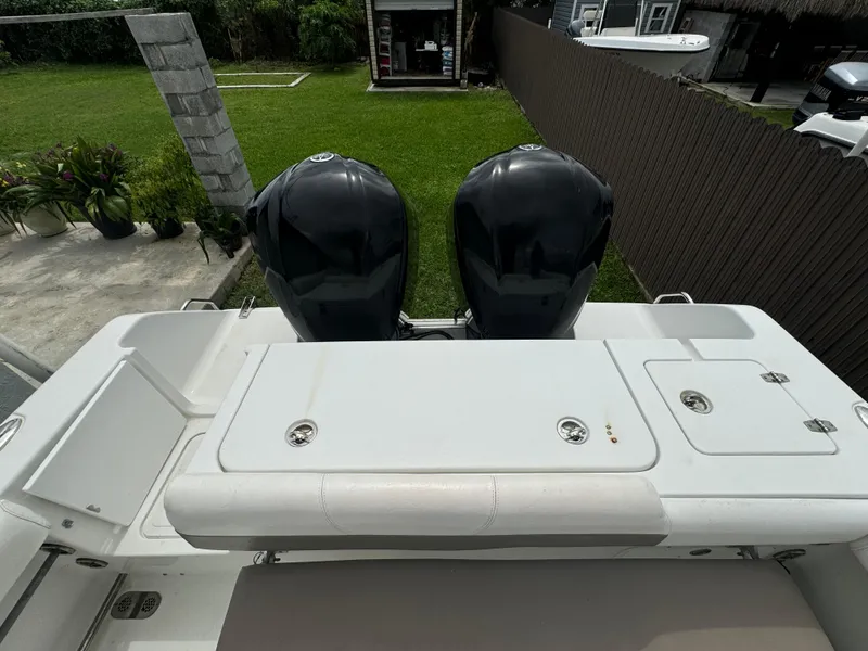 Slide: The Image of 2011 Sea Hunt Gamefish 29 boat with dual outboard motors, viewed from above. - 10