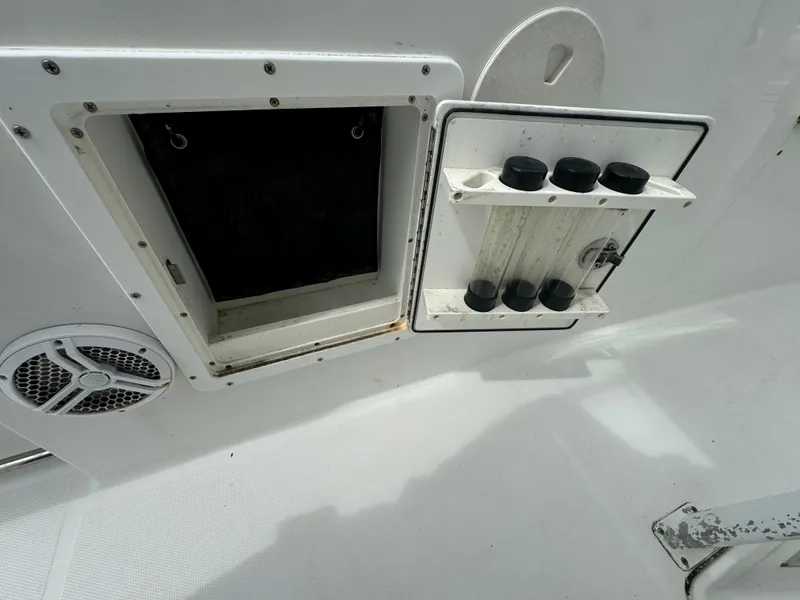Slide: The Image of Sea Hunt Gamefish 29 boat storage compartment and speaker, 2011 model. - 27