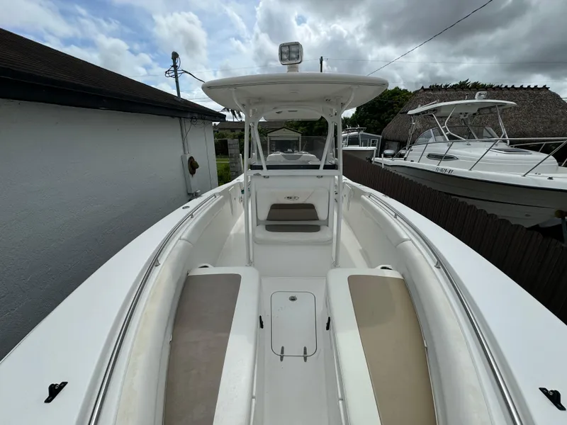 Slide: The Image of 2011 Sea Hunt Gamefish 29 boat with spacious deck and seating. - 35