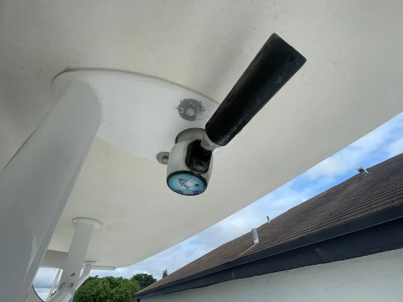 Slide: The Image of 2011 Sea Hunt Gamefish 29 boat detail with mounted gauge and rod holder. - 37