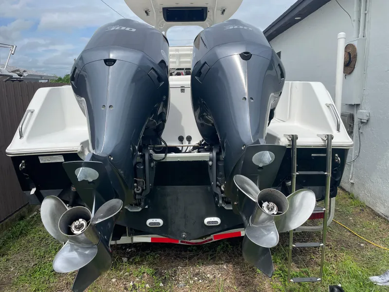 Slide: The Image of 2011 Sea Hunt Gamefish 29 with dual outboard motors, rear view. - 7