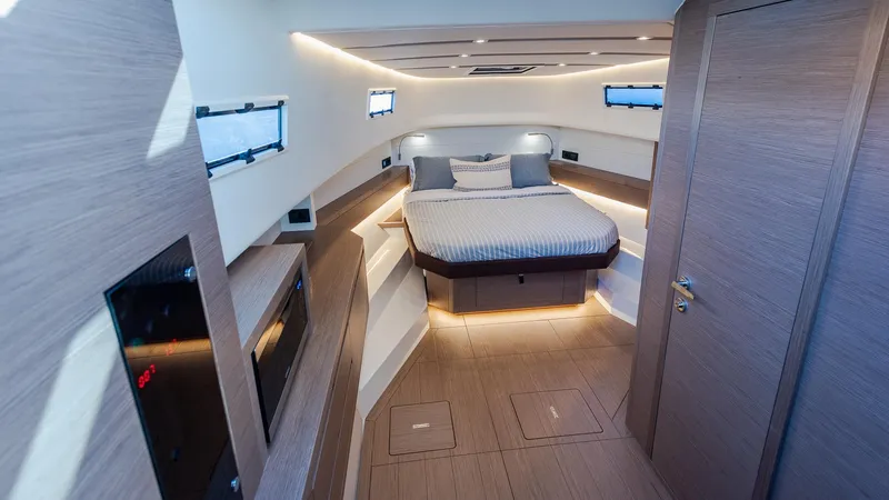 Slide: The Image of Luxurious interior of 2022 Pardo Yachts 43 with modern design and cozy bed. - 24