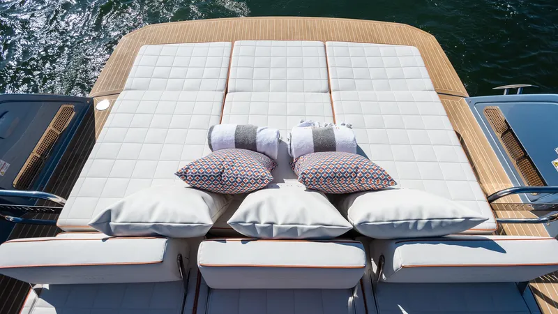 Slide: The Image of Luxurious sunbed on 2022 Pardo Yachts 43, featuring plush cushions and elegant design. - 15