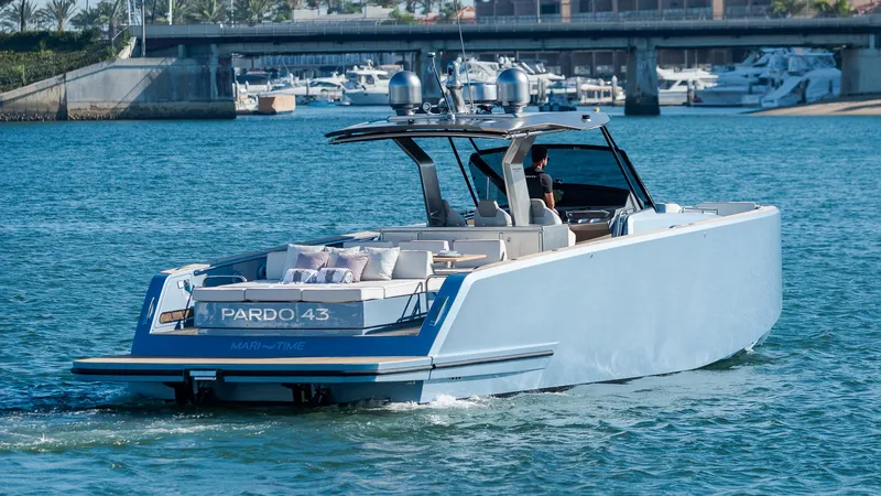 Slide: The Image of 2022 Pardo Yachts 43 cruising in a marina, showcasing sleek design and luxury features. - 3