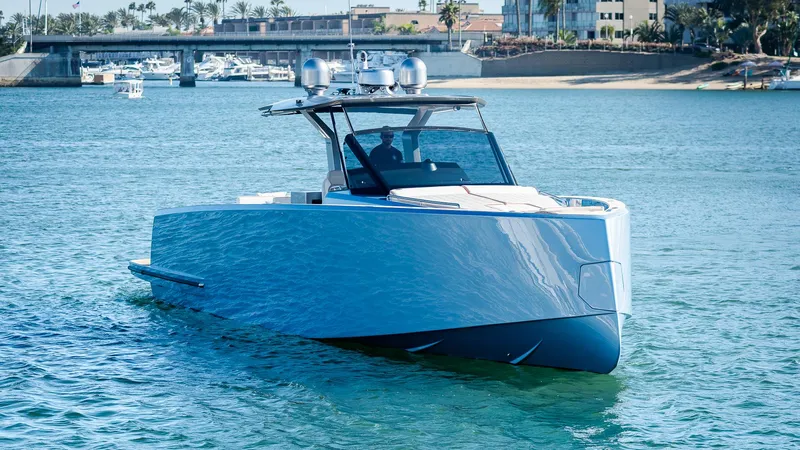 Slide: The Image of 2022 Pardo Yachts 43 cruising on a sunny day near a bridge. - 0