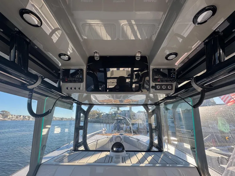 Slide: The Image of 2023 Cape Horn 39T boat interior with luxurious seating and waterfront view. - 10
