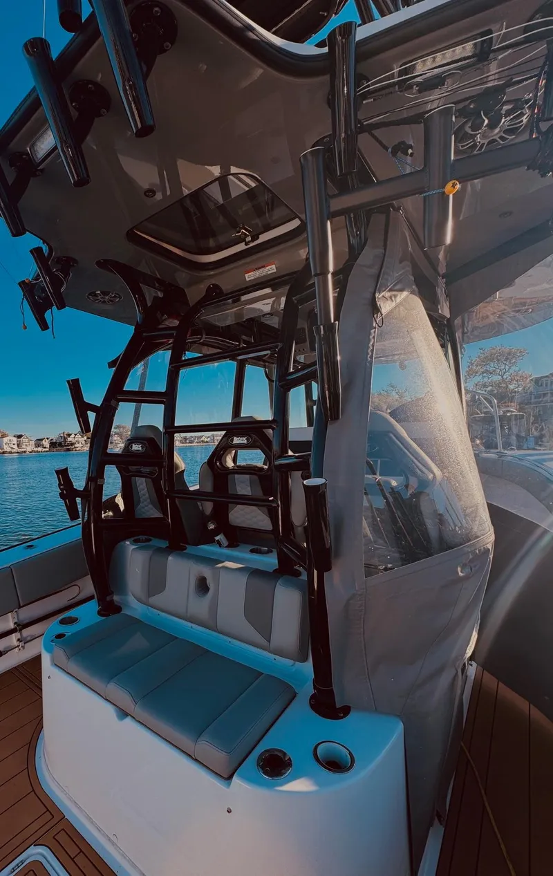 Slide: The Image of Cape Horn 39T 2023 boat anchor and chain on deck by the water. - 13
