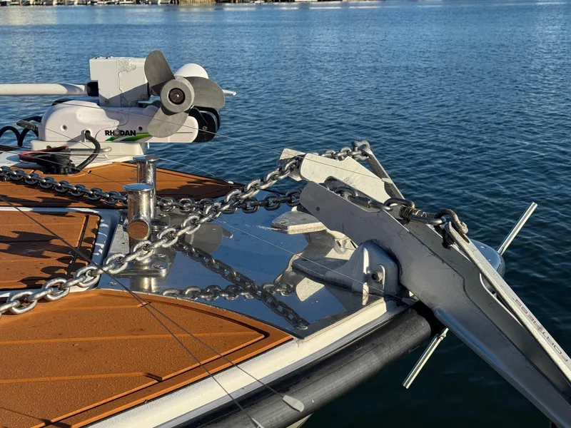 Slide: The Image of Cape Horn 39T boat with DuraBrite lights, 2023 model, docked under clear blue sky. - 14