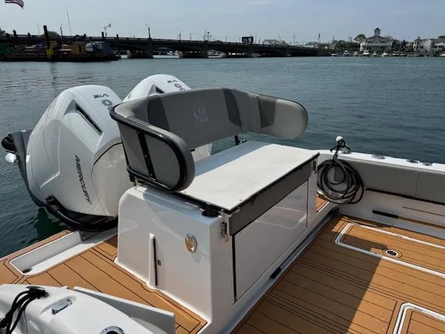 Slide: The Image of Helm of 2023 Cape Horn 39T boat with multiple navigation screens and controls. - 22