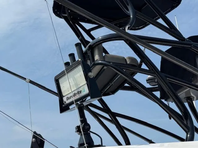 Slide: The Image of 2023 Cape Horn 39T boat with fishing rods and equipment, viewed from the rear. - 32