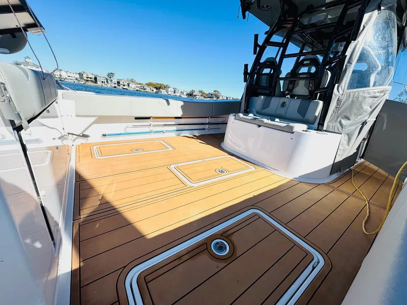 Slide: The Image of 2023 Cape Horn 39T boat with dual Mercury engines on a sunny day. - 21