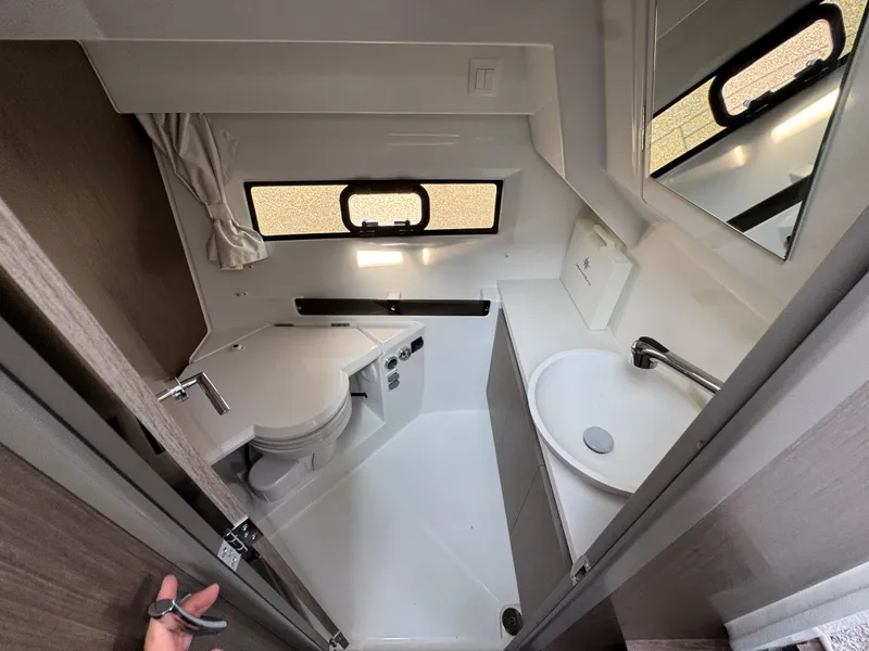 Slide: The Image of 2025 Jeanneau NC 895 Series 2 bathroom with modern fixtures and compact design. - 21