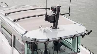 Slide: The Image of 2024 Axopar 37 XC BRABUS Trim Wet Bar roof detail on water. - 7