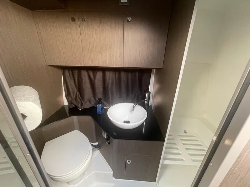 Slide: The Image of 2024 Beneteau Gran Turismo 32 bathroom with modern fixtures and compact design. - 12