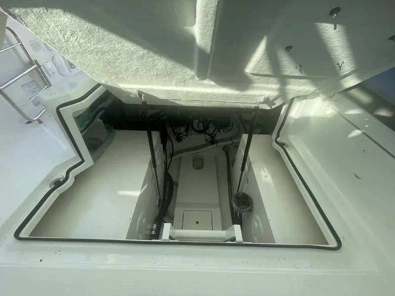 Slide: The Image of Engine compartment of 2024 Beneteau Gran Turismo 32, showcasing interior details and structure. - 15