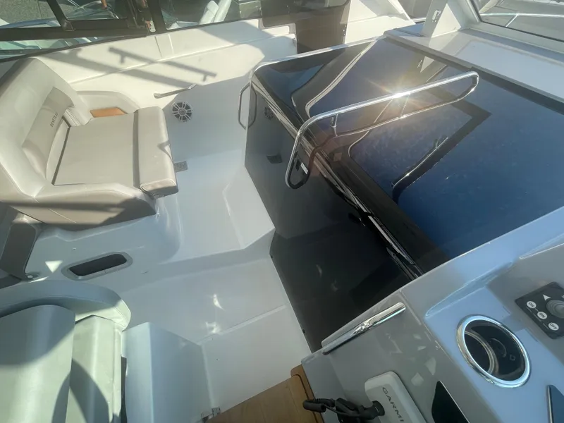 Slide: The Image of 2024 Beneteau Gran Turismo 32 cockpit with modern seating and sleek dashboard design. - 17