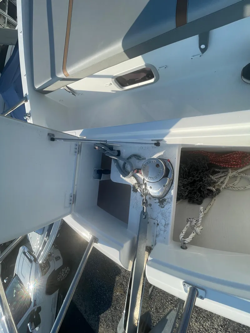 Slide: The Image of 2024 Beneteau Gran Turismo 32 yacht deck with anchor storage and winch. - 21