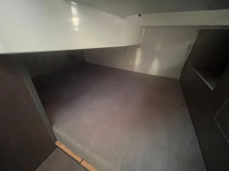 Slide: The Image of 2024 Beneteau Gran Turismo 32 interior cabin space, featuring modern design and ample room. - 26