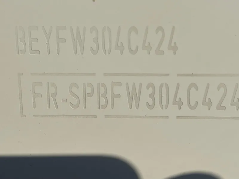 Slide: The Image of 2024 Beneteau Gran Turismo 32 hull identification number engraved on the boat's surface. - 38