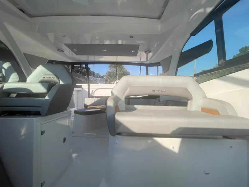 Slide: The Image of 2024 Beneteau Gran Turismo 32 interior with modern seating and sleek design. - 7