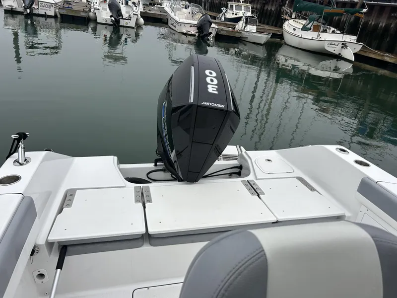 Slide: The Image of 2021 Release 240RX boat with Mercury 300 outboard engine at marina. - 4