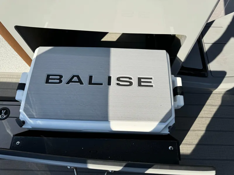 Slide: The Image of Balise Helix 24L cooler on a boat deck, 2025 model. - 24