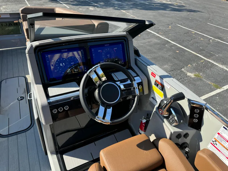 Slide: The Image of Modern boat dashboard with dual screens and leather seats, Balise Helix 24L, 2025 model. - 27