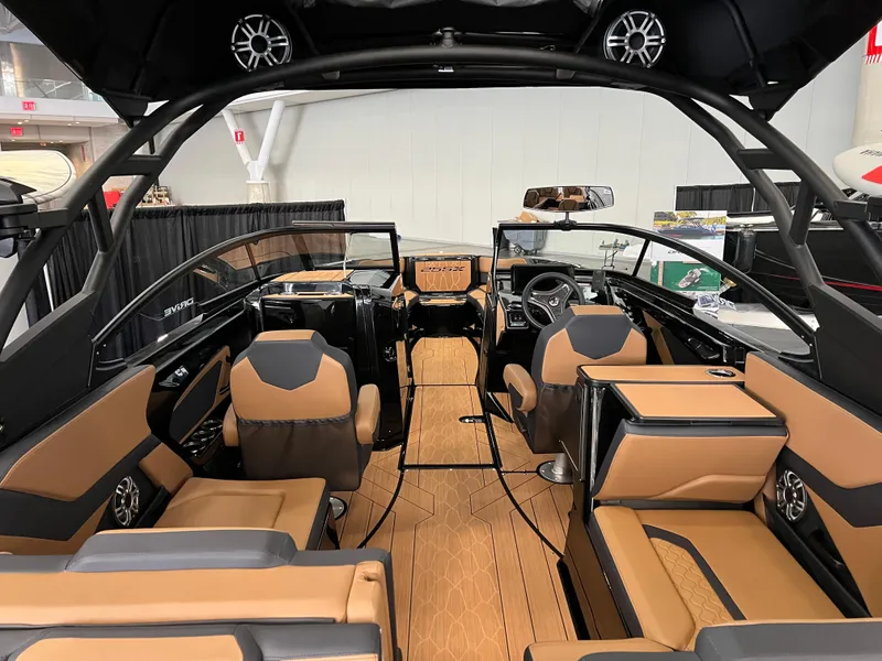 Slide: The Image of 2025 Yamaha Boats 255XD interior with luxurious seating and modern design. - 7